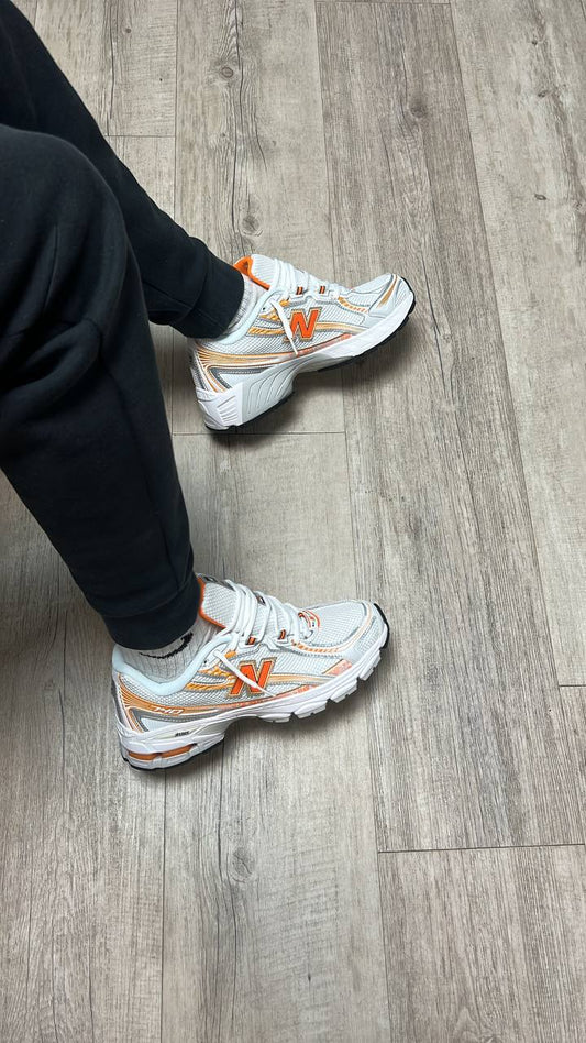 New Balance 740 orange et blanche